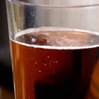 A close up of a glass of beer 