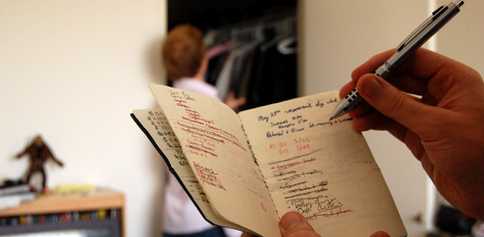 A notebook in front of a closet