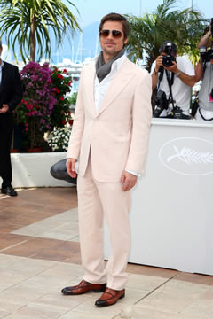 Brad Pitt sporting a light pink suit