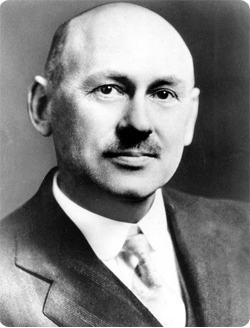 Robert H. Goddard wearing a suit and tie