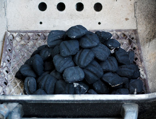 Charcoal in a pyramid
