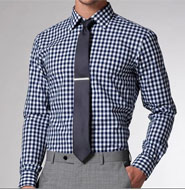 A man wearing a tie and gingham shirt