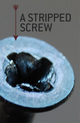 A close up of a stripped screw