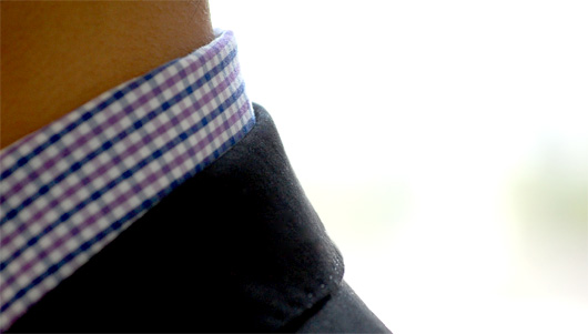 Close up of shirt and suit collar