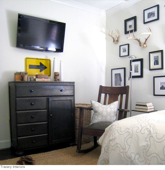 A bedroom filled with furniture and a flat screen tv