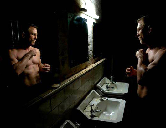 Daniel Craig looking in mirror