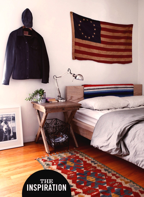 A bedroom with a flag