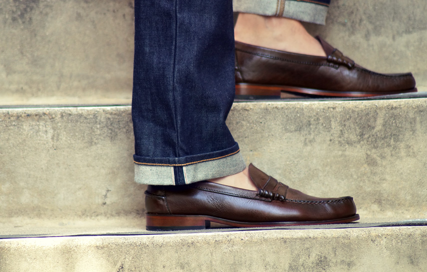 Man wearing jeans with loafers