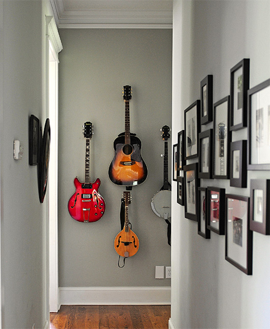 3 guitars on wall
