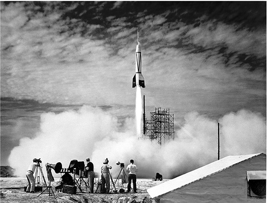 People watching a rocket launch