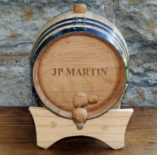 A barrel sitting on top of a wooden table