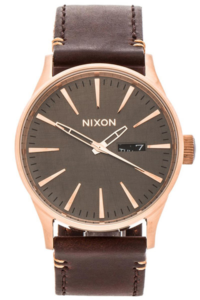 Nixon rose gold watch with brown strap