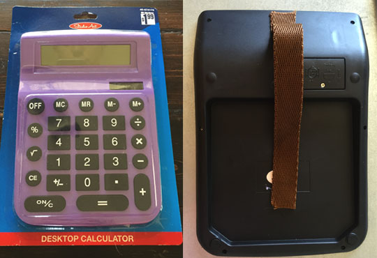 Front and back of calculator with strap attached
