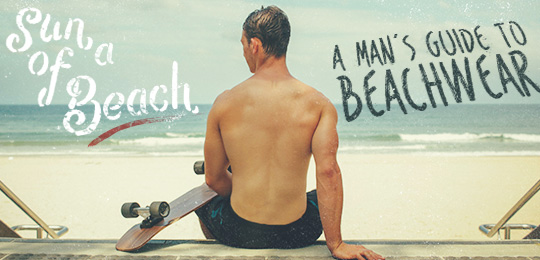 A man sitting at a beach