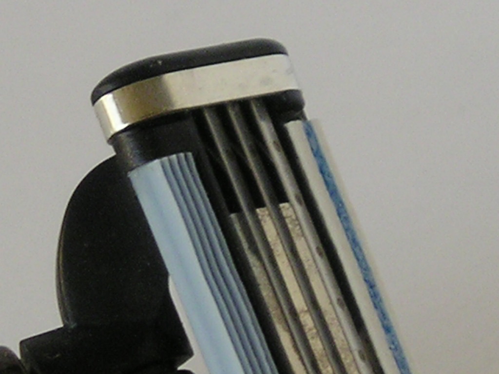 close up of multiblade razor shaving tips