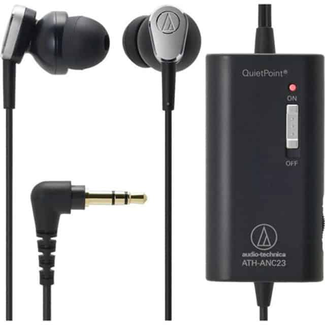 A pair of Audio Technica QuietPoint Active Noise Cancelling In Ear Headphones with noise canceling unit