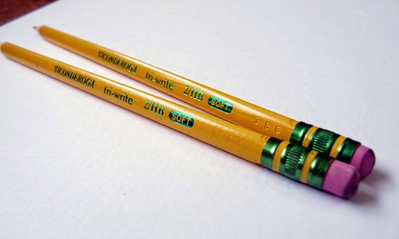 2 Dixon pencils sitting on white paper