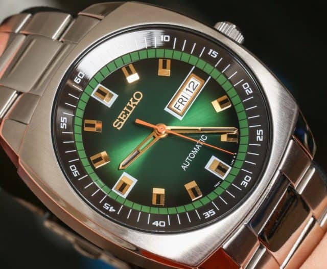 Close up of Seiko Men's Analog Green Dial Automatic Silver Stainless Steel Watch