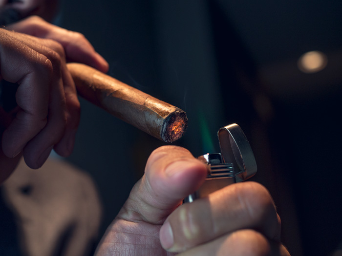 how to properly light a cigar with a lighter