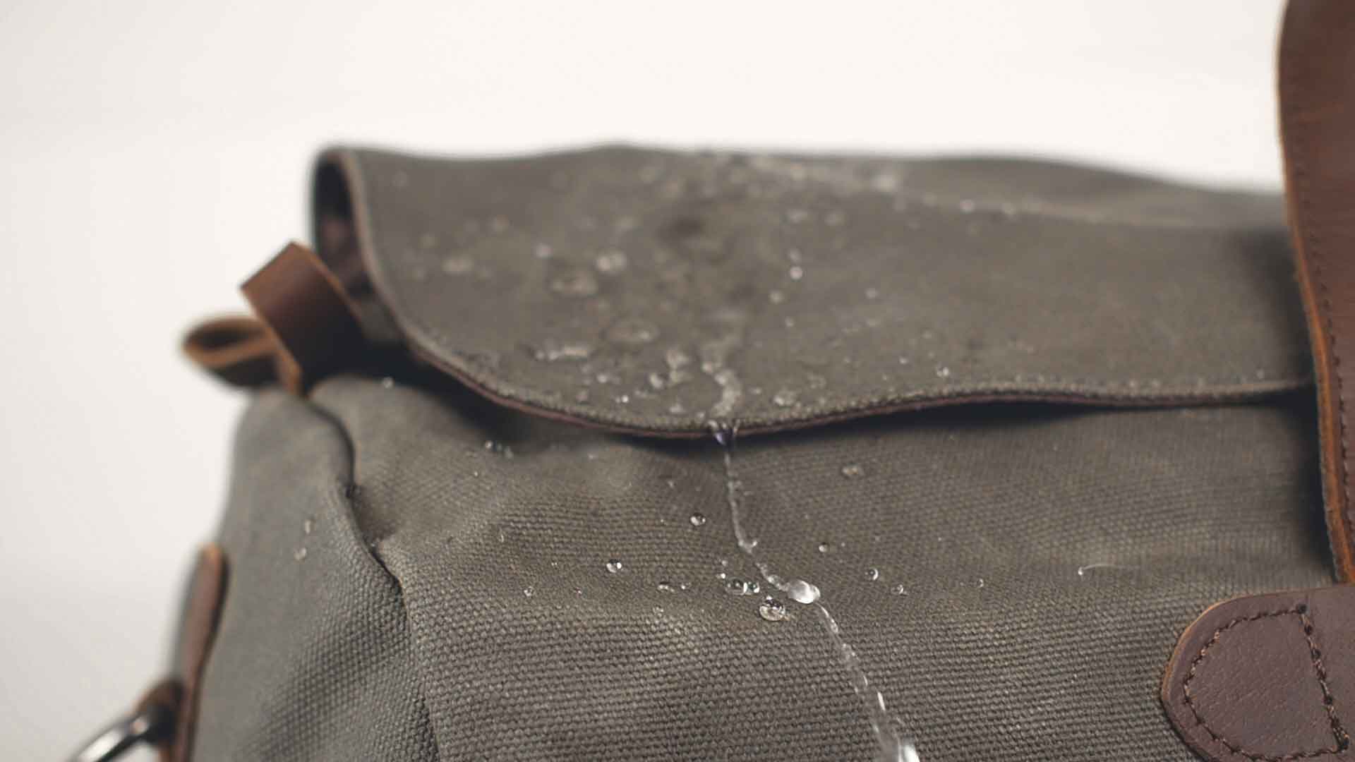 water running off of waxed canvas