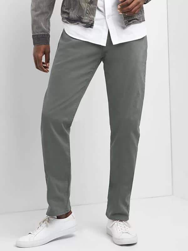 A person modeling gray pants