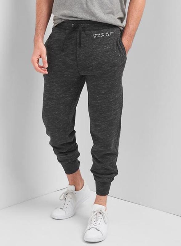 A person modeling sweat pants