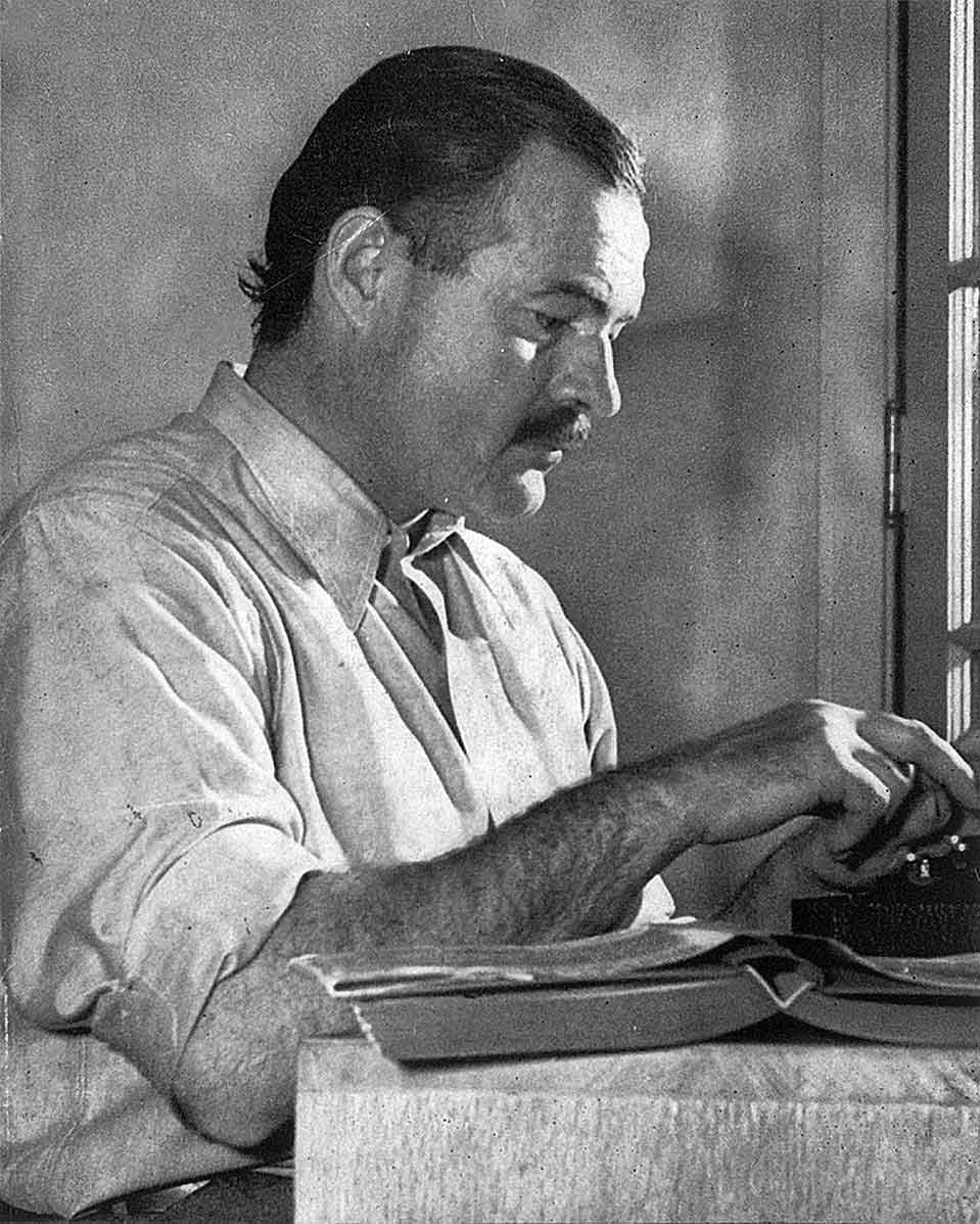 Ernest Hemingway at typewriter