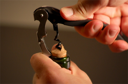 Sommeliers knife pulling a cork