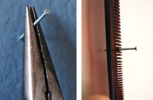 hold a nail with pliers or a comb
