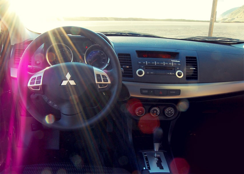 steering wheel and interior details of mitsubishi lancer vehicle