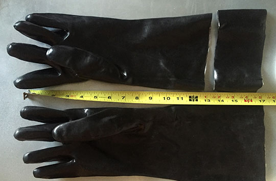 chemical gloves and a measuring tape to measure length of gloves for DIY Ghostbuster costume