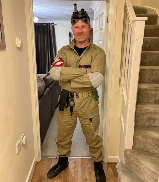 image of man wearing a homemade ghostbusters Halloween costume