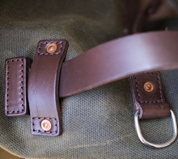 the leather strap of a mountainback bag