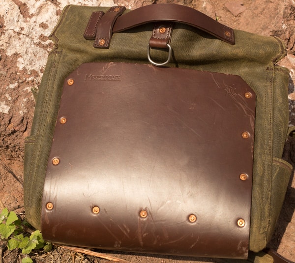 the leather back of a canvas bag