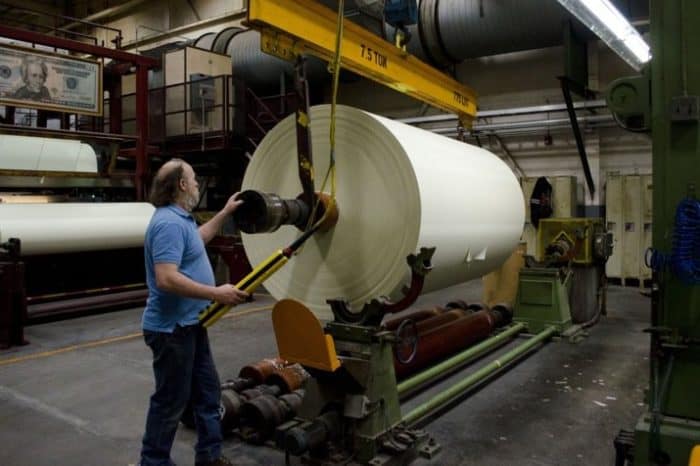 A roll of US currency paper at Crane and Co paper mill