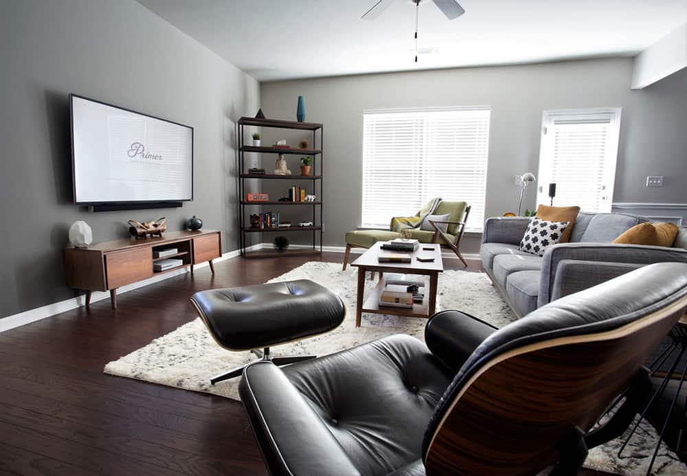 a living room area with modern decor and furnishing