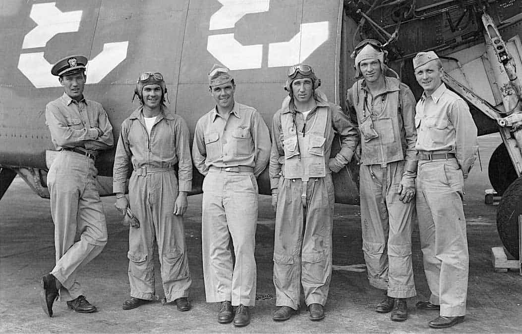 A group of people in uniform posing for a photo