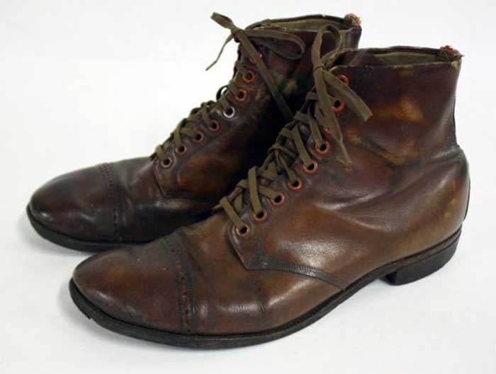 A pair of brown service boots