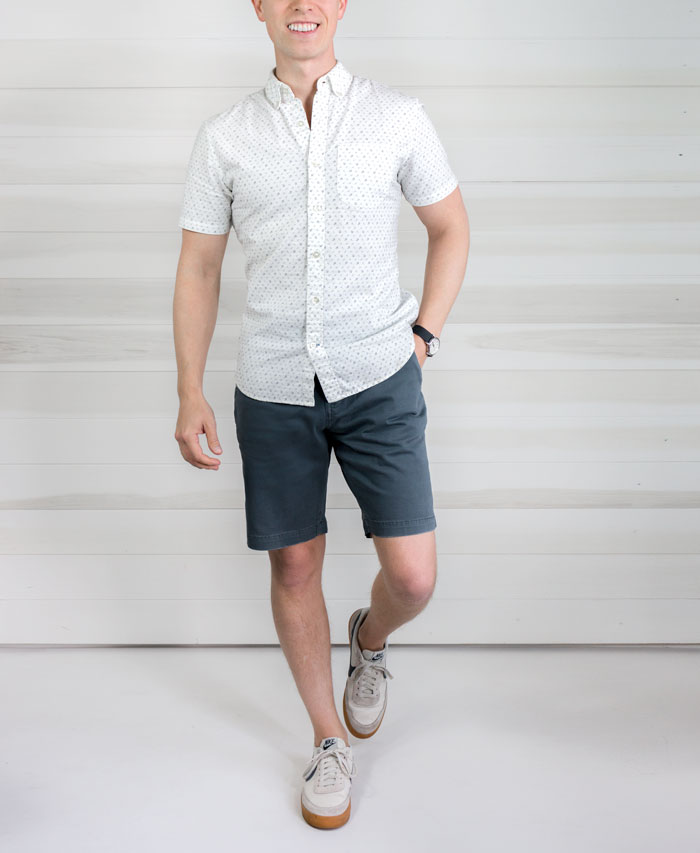 men's spring summer fashion white button up short sleeve shirt blue shorts above the knee