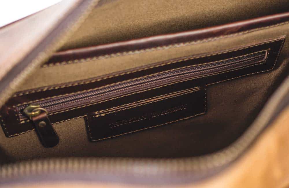interior pocket of brown leather briefcase