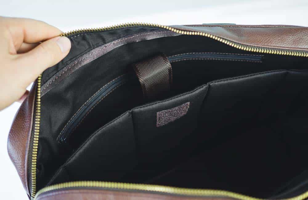 interior pocket of brown leather briefcase