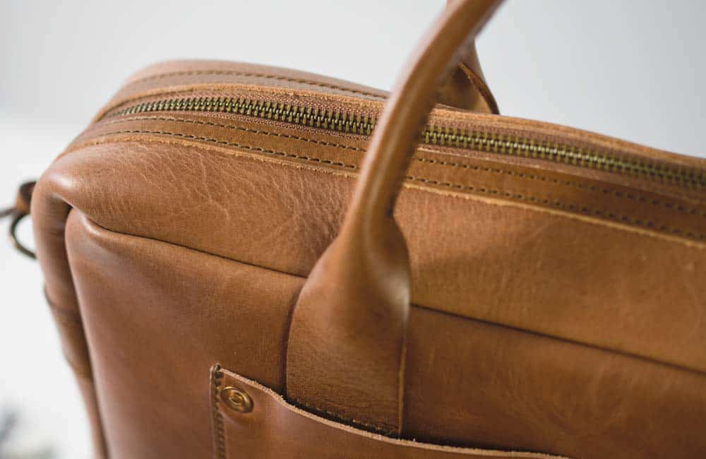 handle of brown leather briefcase
