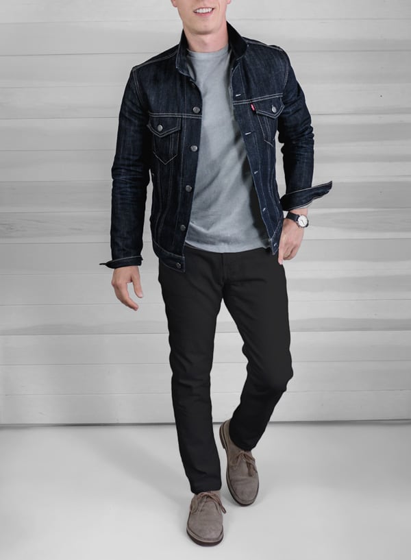 a blue denim jacket with gray t-shirt, black jeans, and tan boots