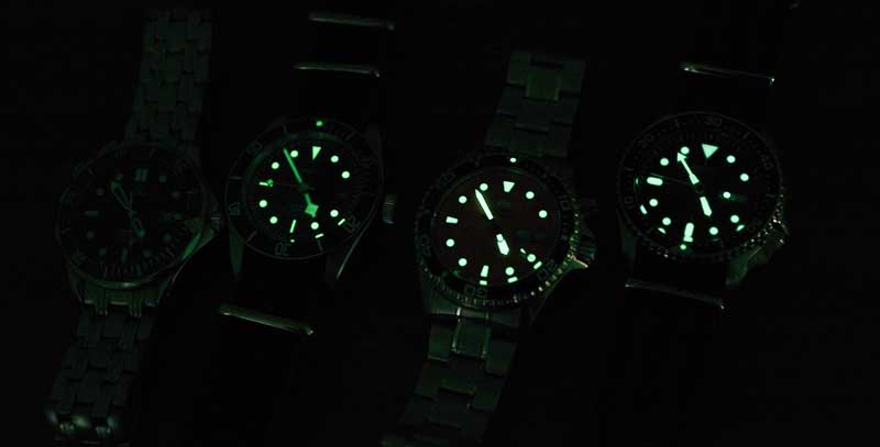 dive watch lume on 4 watches