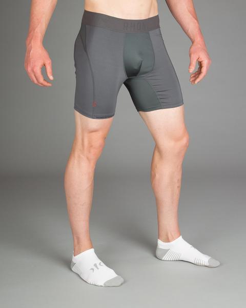A man posing for a picture, with Compression Short