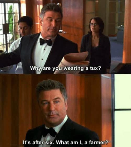 Alec Baldwin wearing a tux posing for a picture