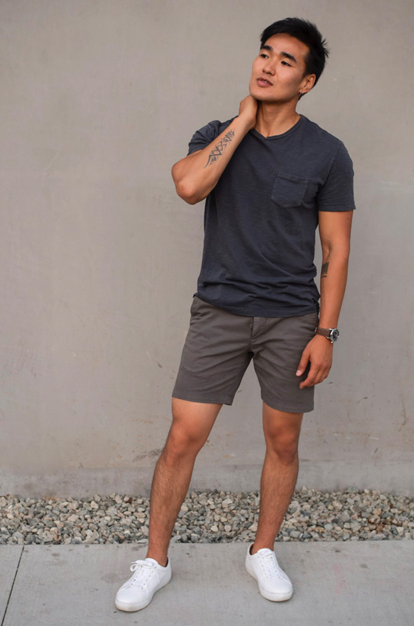 black pocket t shirt gray shorts white sneakers