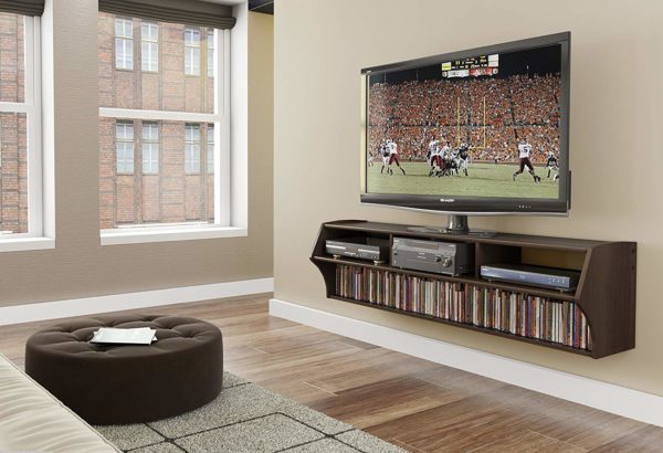 a space saving floating television stand with equiptment storage in a living room area