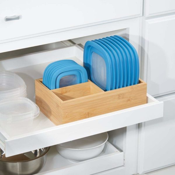 a space saving tupperware lid organizer