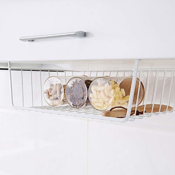 space saving under shelf storage basket holding several glass jars and a utensil